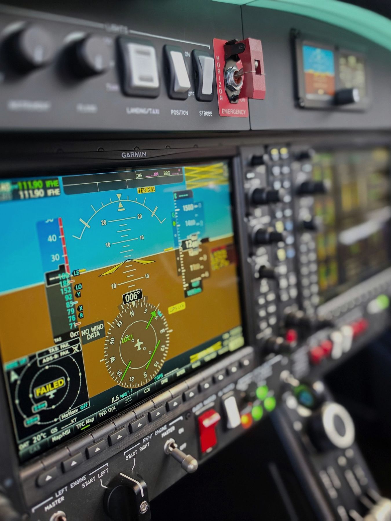 Garmin glass-cockpit display and switches in a light aircraft panel